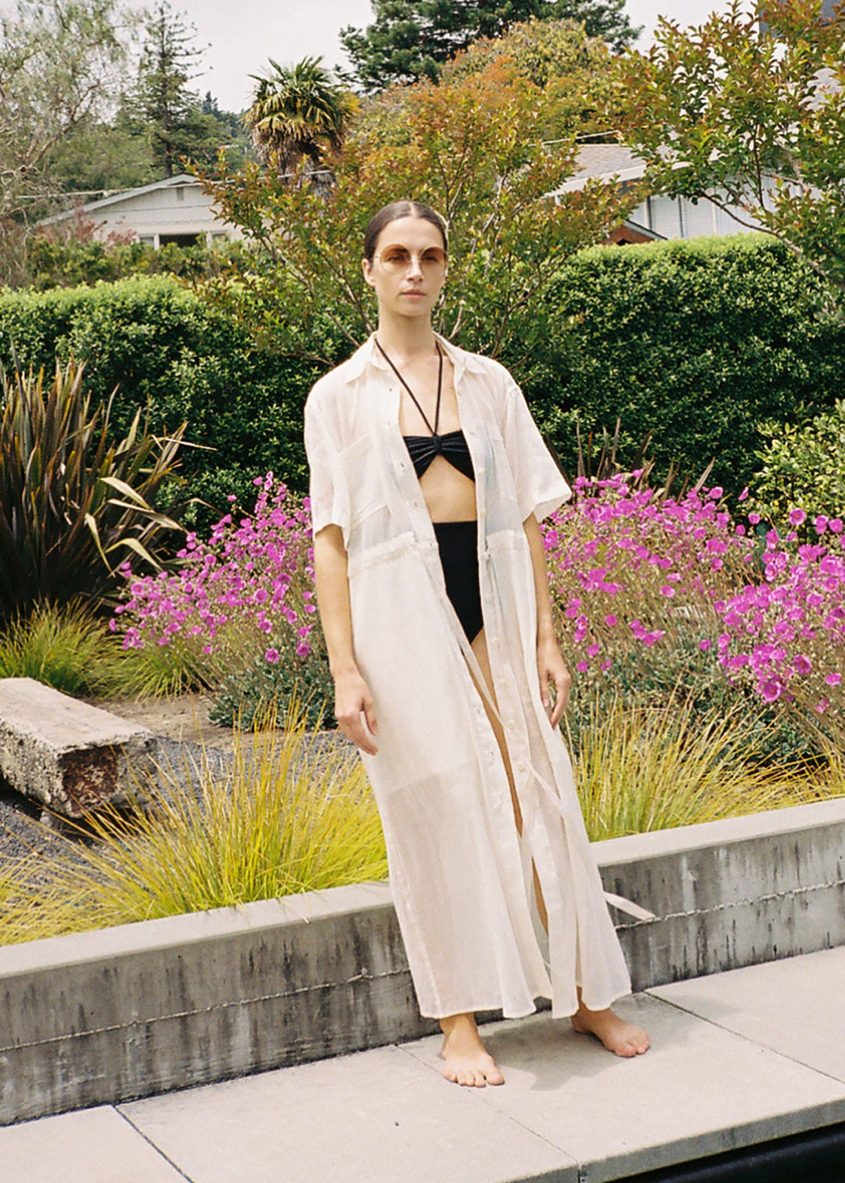 Side view of the white semi-sheer Japanese cotton voile Kamperett Antoine Shirt Dress.