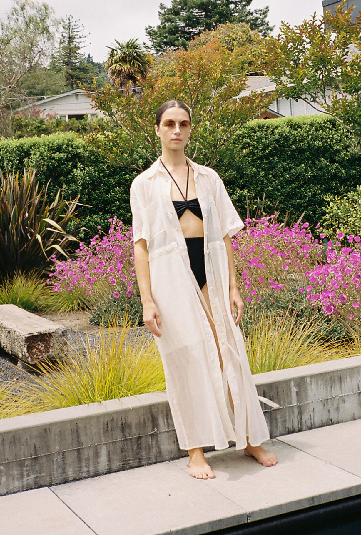 Side view of the white semi-sheer Japanese cotton voile Kamperett Antoine Shirt Dress.