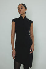 Alternate editorial image of the black wool flannel Kamperett Astrid Vest.