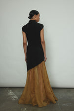 The black Kamperett Astrid Vest styled with the Lalique Gown for a layered occasion look.