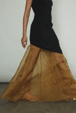 Side view of the black Kamperett Astrid Vest styled with the Lalique Gown.