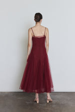 Back view of the bordeaux sheer tulle Kamperett Camille Dress showing the straight-cut bodice.