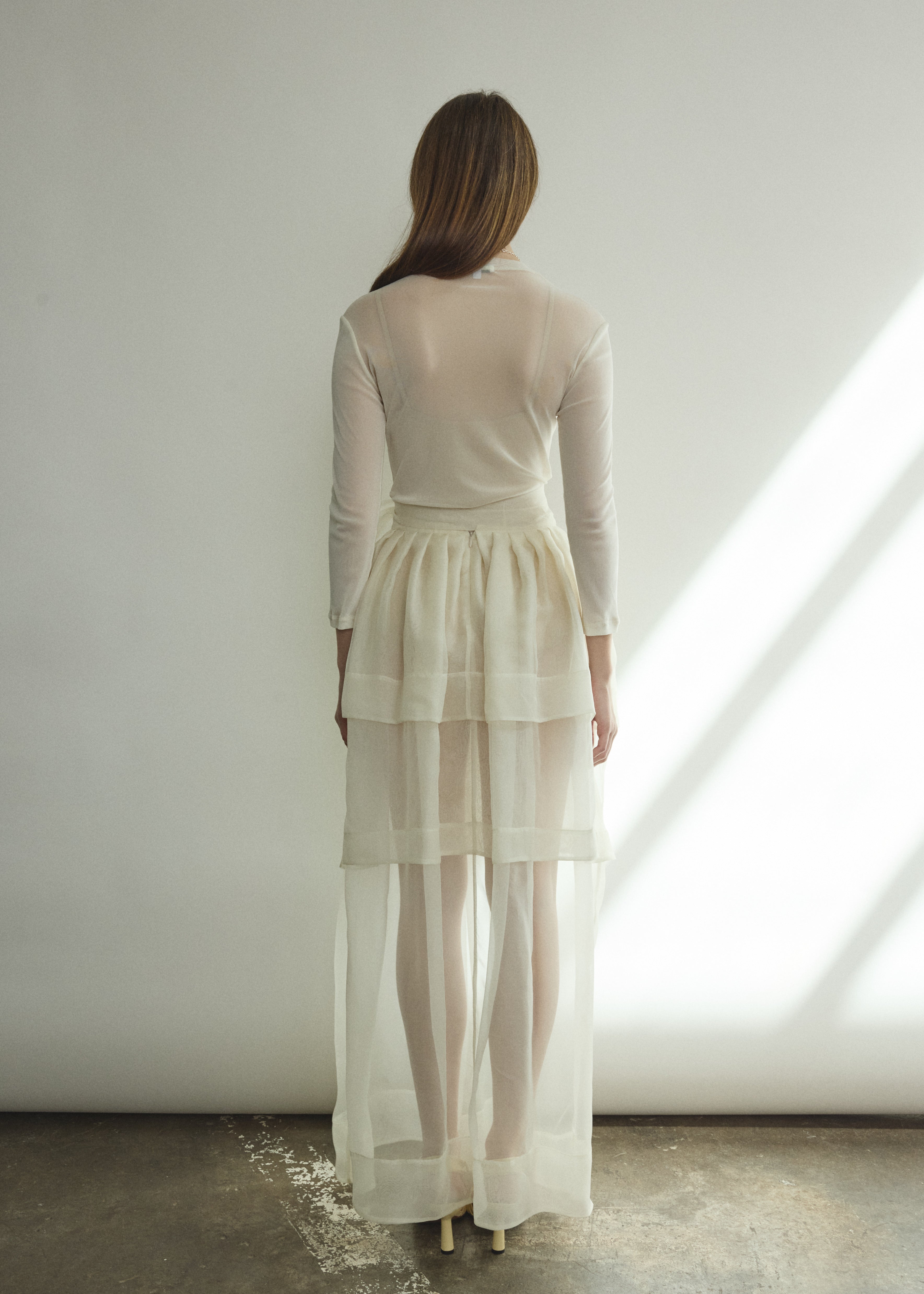 Detail of the self-fabric waistband and long ties on the alabaster silk organza Kamperett Canna Skirt.