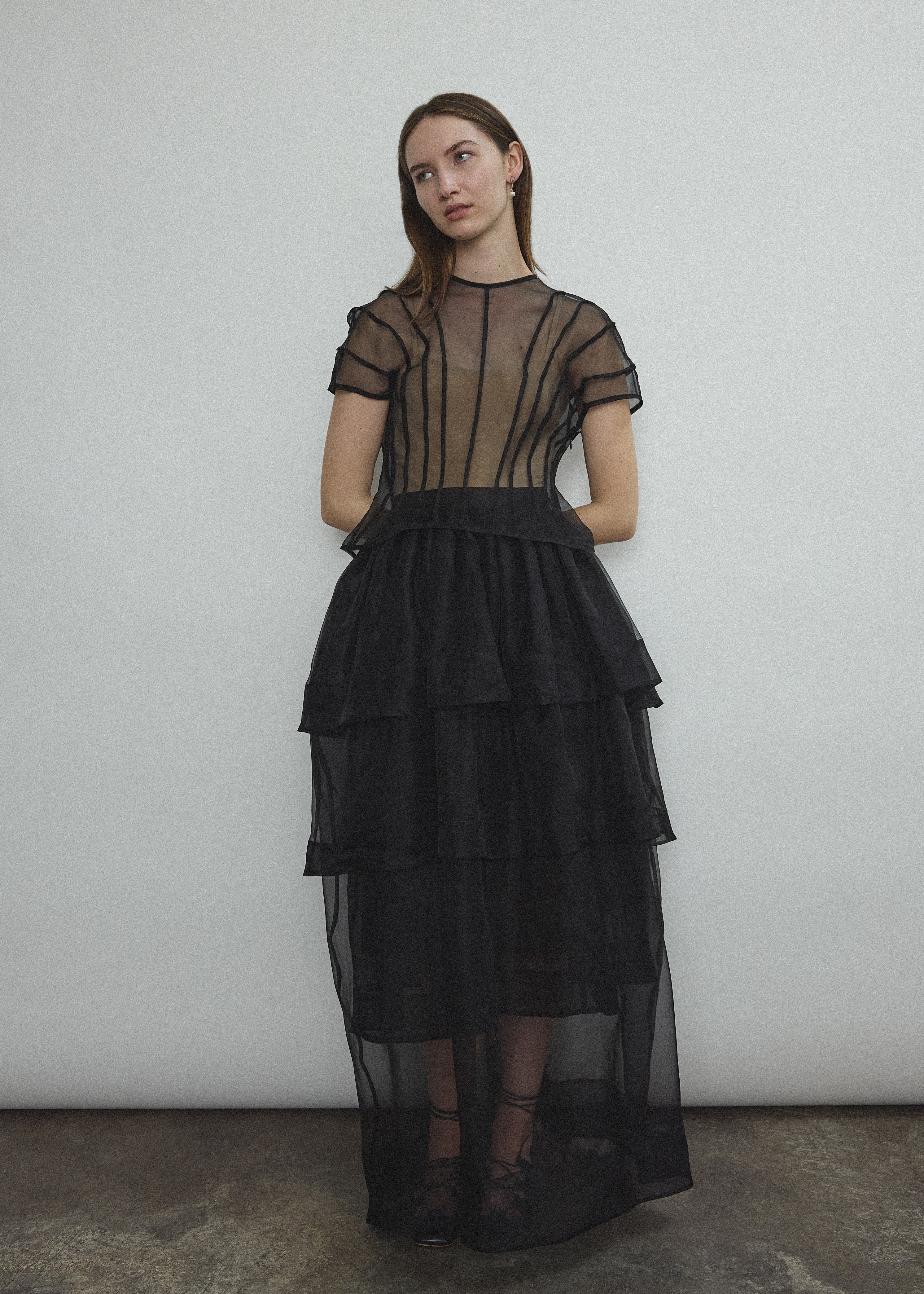 Front view of the black sheer silk organza Kamperett Canna Skirt layered over the Brise Skirt in matching black.