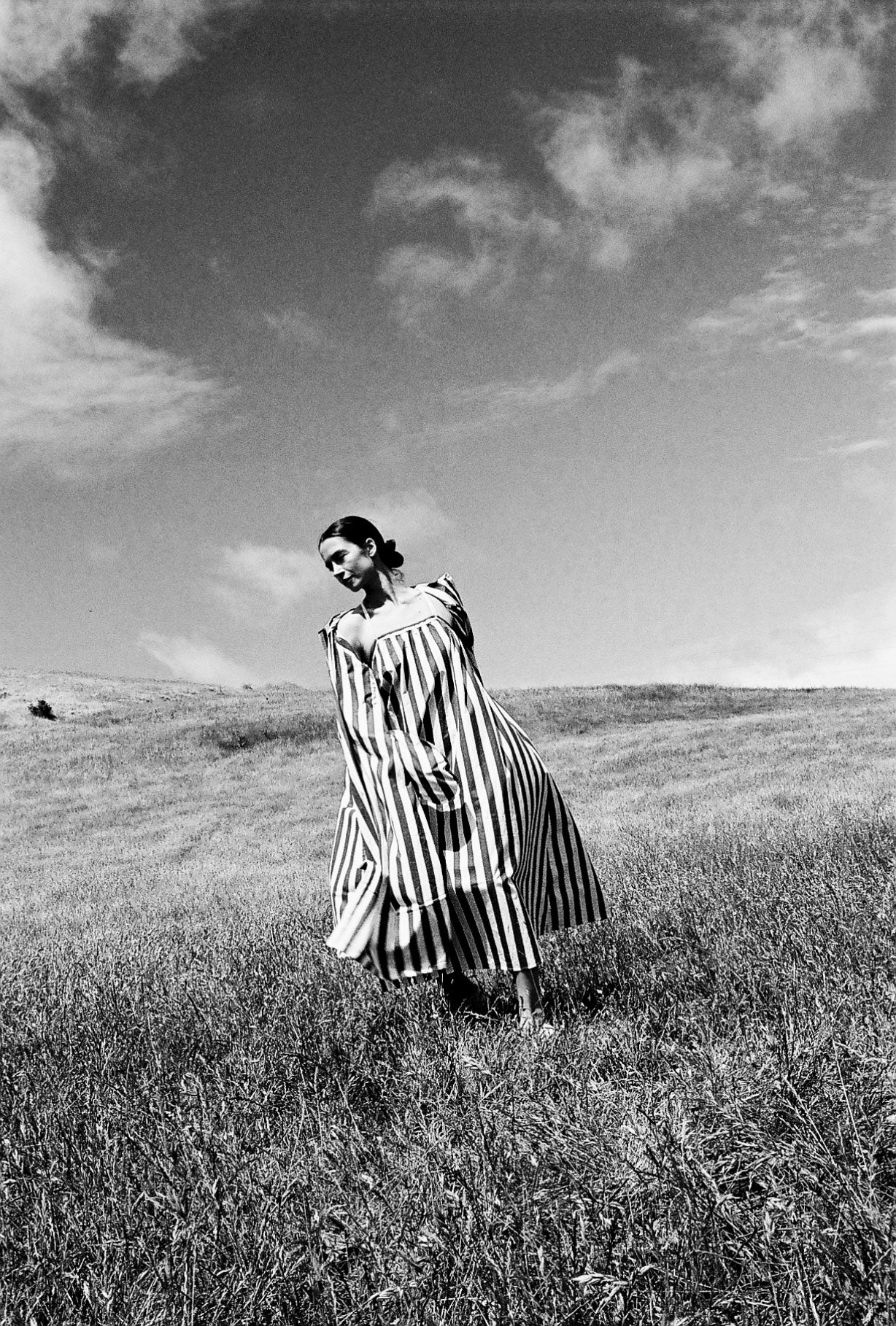 Editorial image of a model in the Cabana stripe Japanese cotton Kamperett Cosette Dress.
