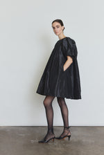 Back view of the black silk taffeta Kamperett Eva Dress showing the pleated sleeves.