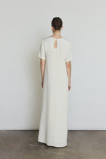 Back view of the alabaster silk crepe Kamperett Galerie Dress with single-button back closure.