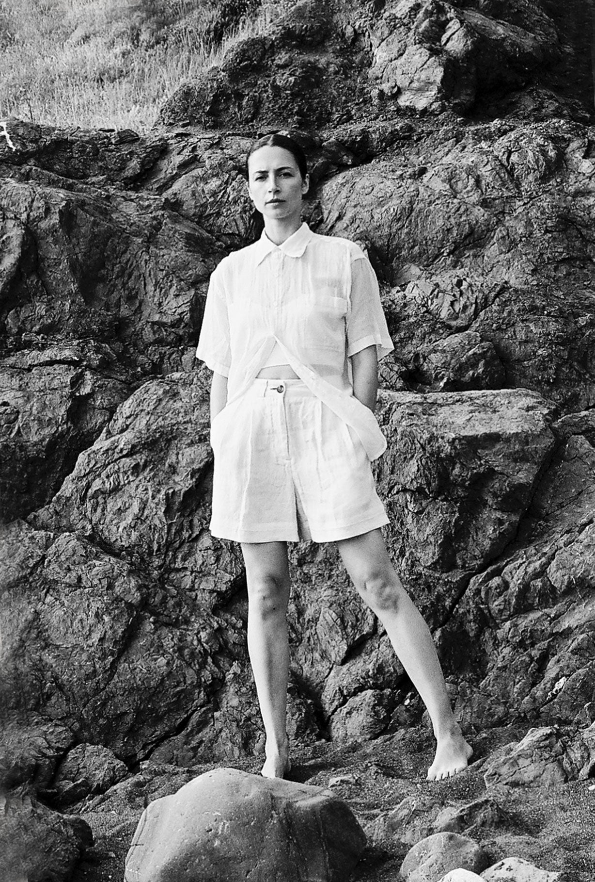 Editorial image of a model wearing the ivory Japanese linen Kamperett Henri Short.