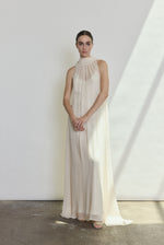 Side view of the ivory silk chiffon Kamperett Iris Gown showing the floating capelet.
