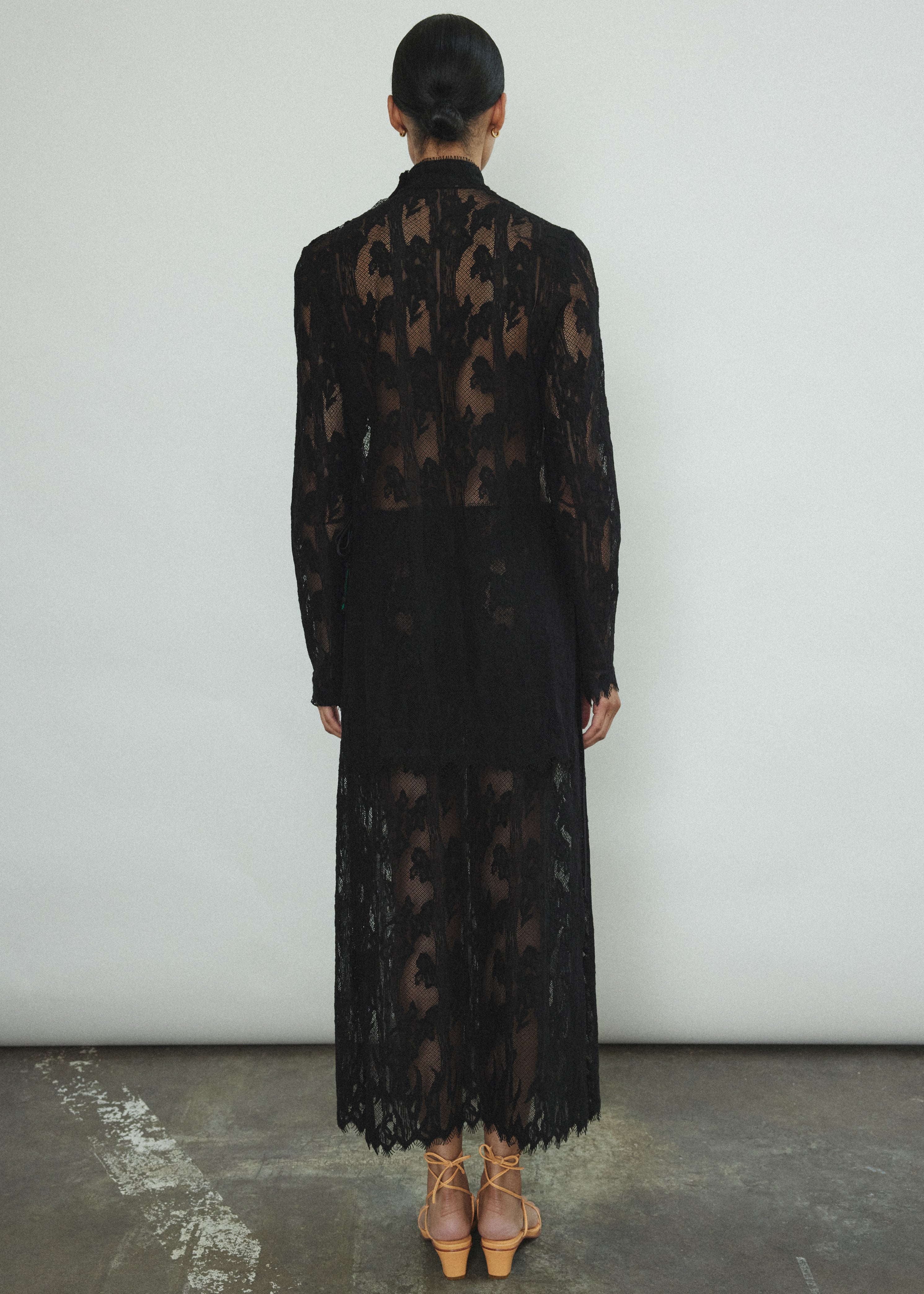 Kamperett Isabella Tunic rear view highlighting open side seams with draped silk cord ties, eyelash lace sleeve edge, and clean back construction of imported French lace.