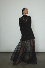 Kamperett Isabella Tunic in black French lace, front view, mock neck silhouette with eyelash lace hem and open side seams