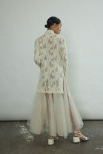 Kamperett Isabella Tunic rear view highlighting open side seams with draped silk cord ties, eyelash lace sleeve edge, and clean back construction of imported French lace.