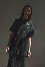 Alternate editorial image of the black French lace Kamperett Jette Tee.