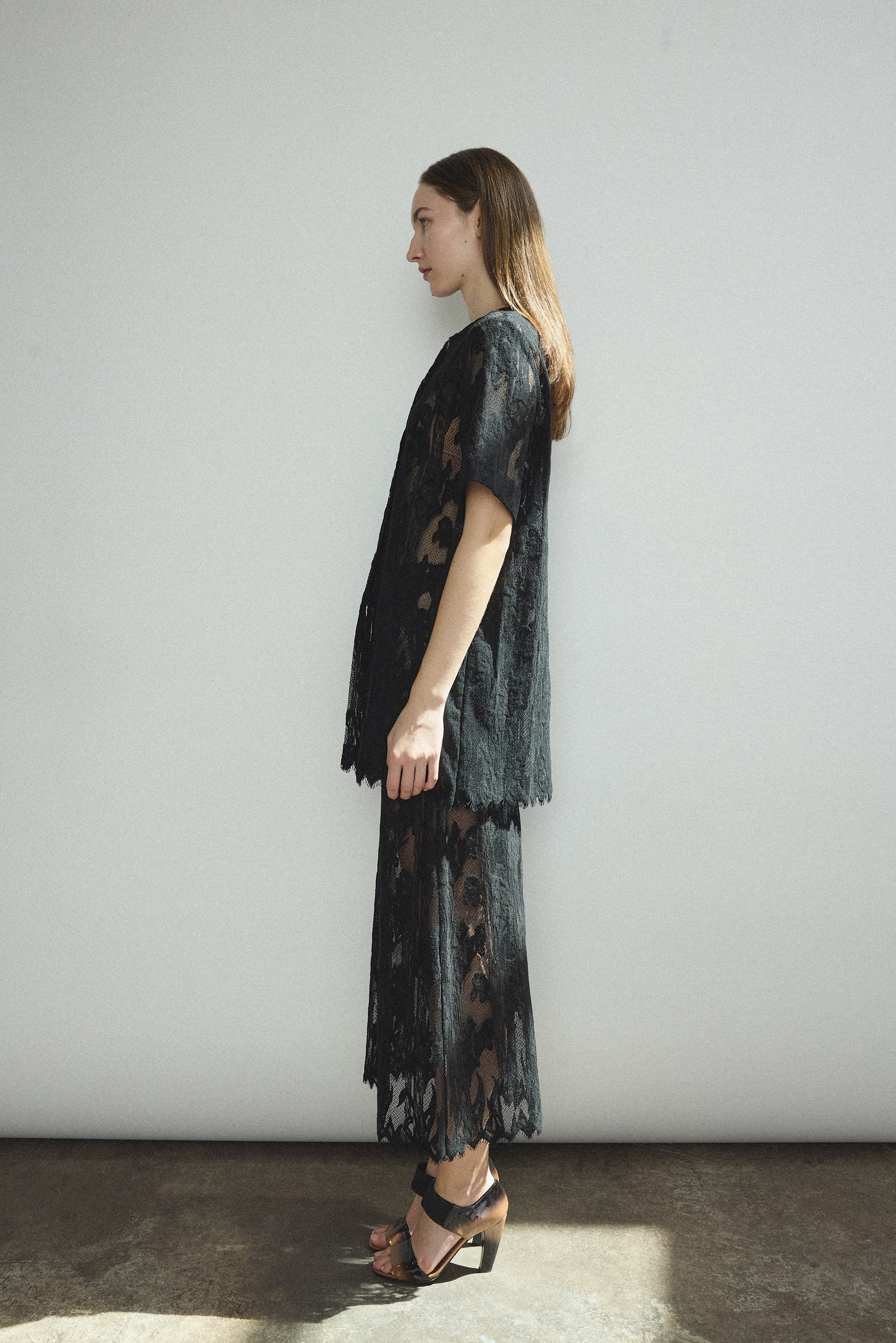The black French lace Kamperett Jette Tee styled with the Huene Pant and Isabella Skirt.