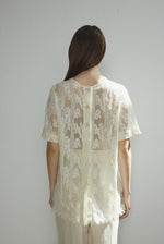 Alternate editorial image of the cream French lace Kamperett Jette Tee.