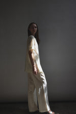 The cream French lace Kamperett Jette Tee styled with the Huene Pant.