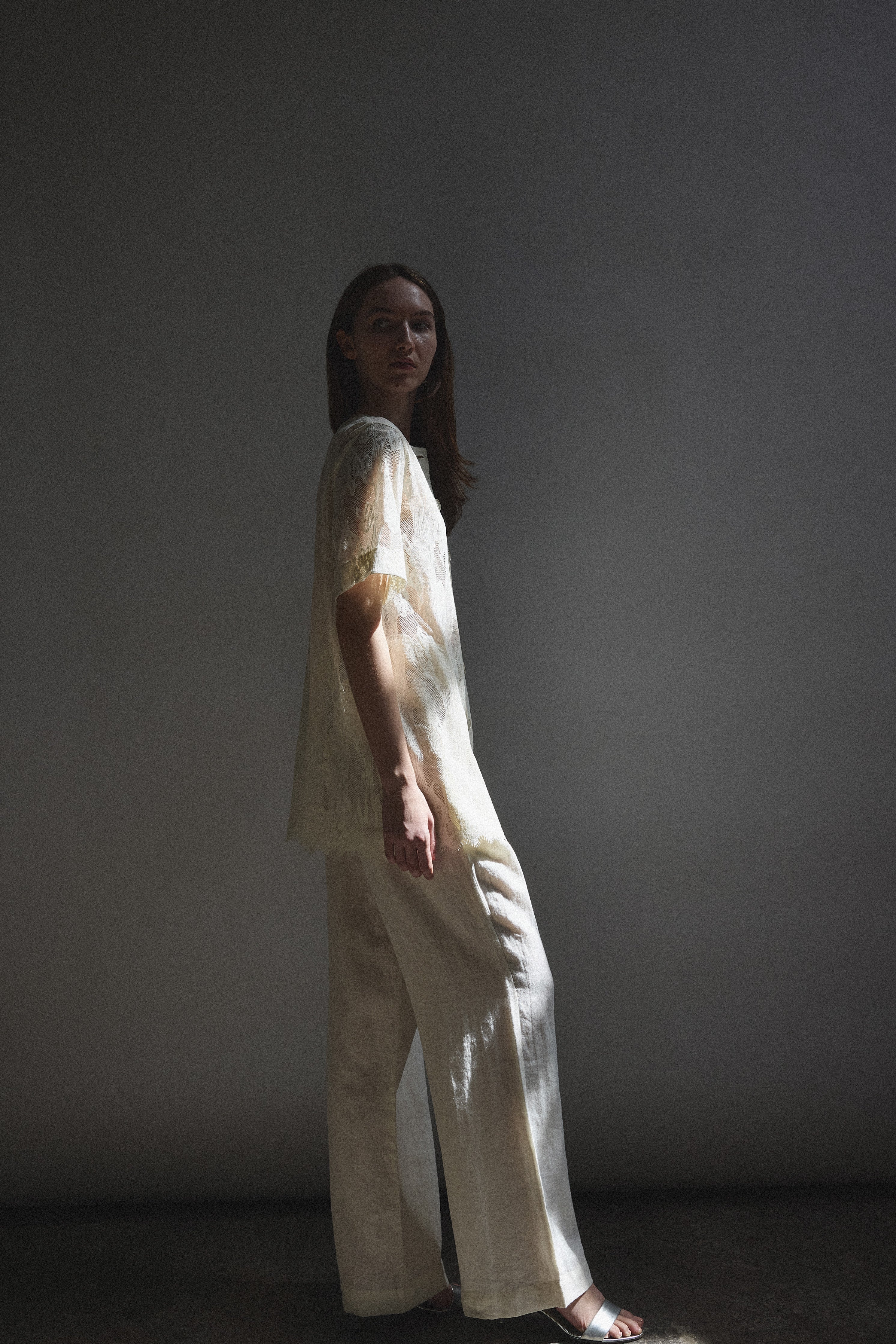 The cream French lace Kamperett Jette Tee styled with the Huene Pant.