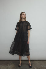 Alternate styled view of the black silk organza Kamperett Jette Tee.
