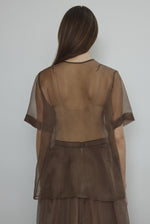 Back view of the mushroom silk organza Kamperett Jette Tee showing the reversible shoulder darts.