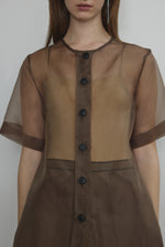 Detail of the wide button placket on the mushroom silk organza Kamperett Jette Tee.