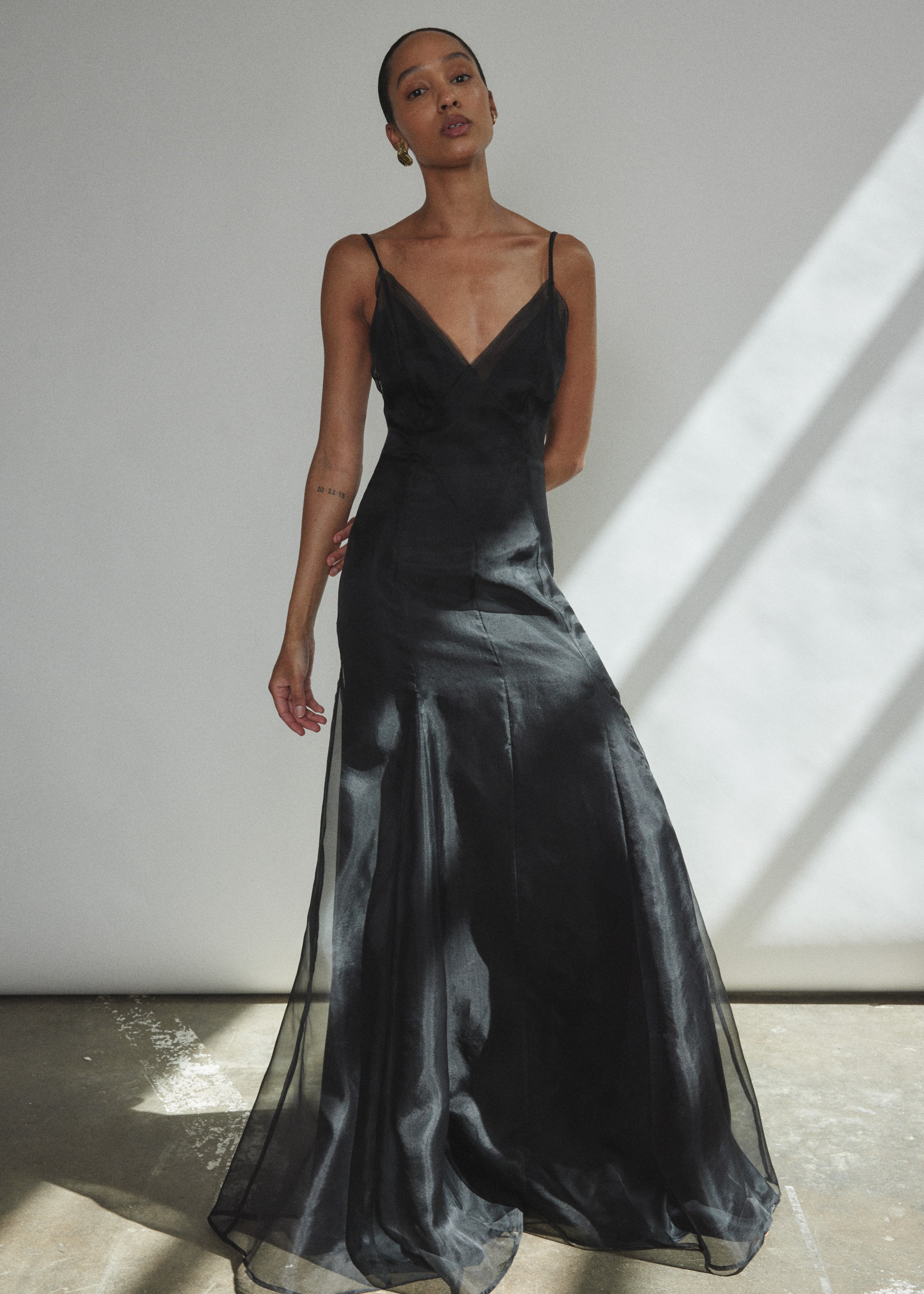 Back view of the black silk organza Kamperett Lalique Gown with invisible center-back zip closure.