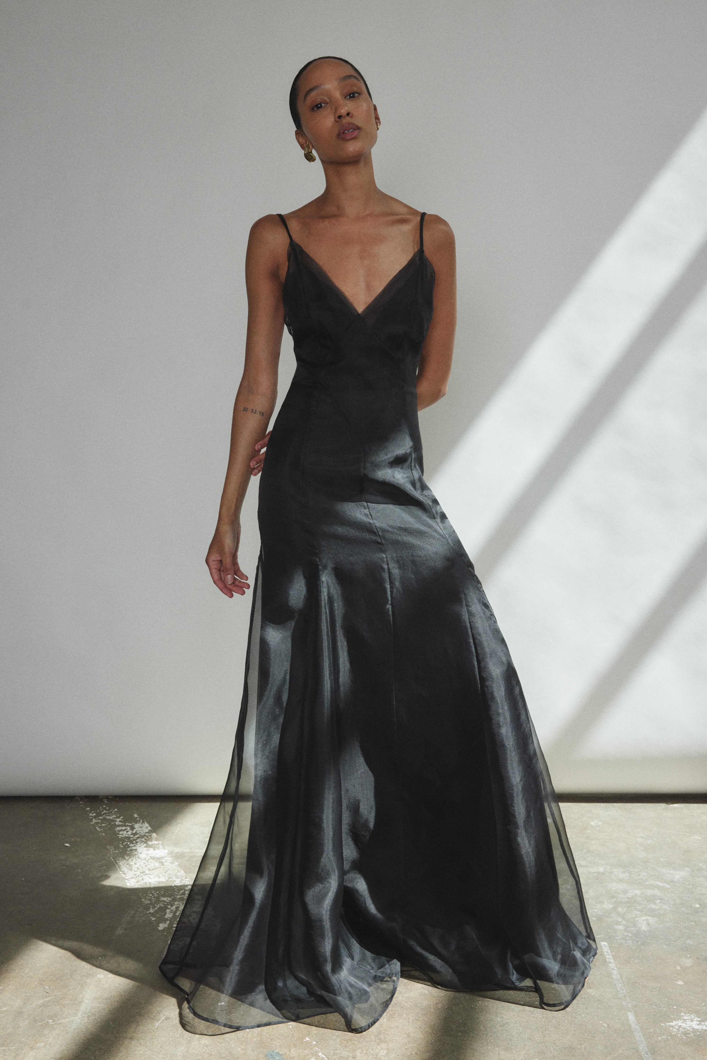Back view of the black silk organza Kamperett Lalique Gown with invisible center-back zip closure.