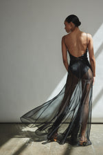 Editorial image of the black silk organza Kamperett Lalique Gown.