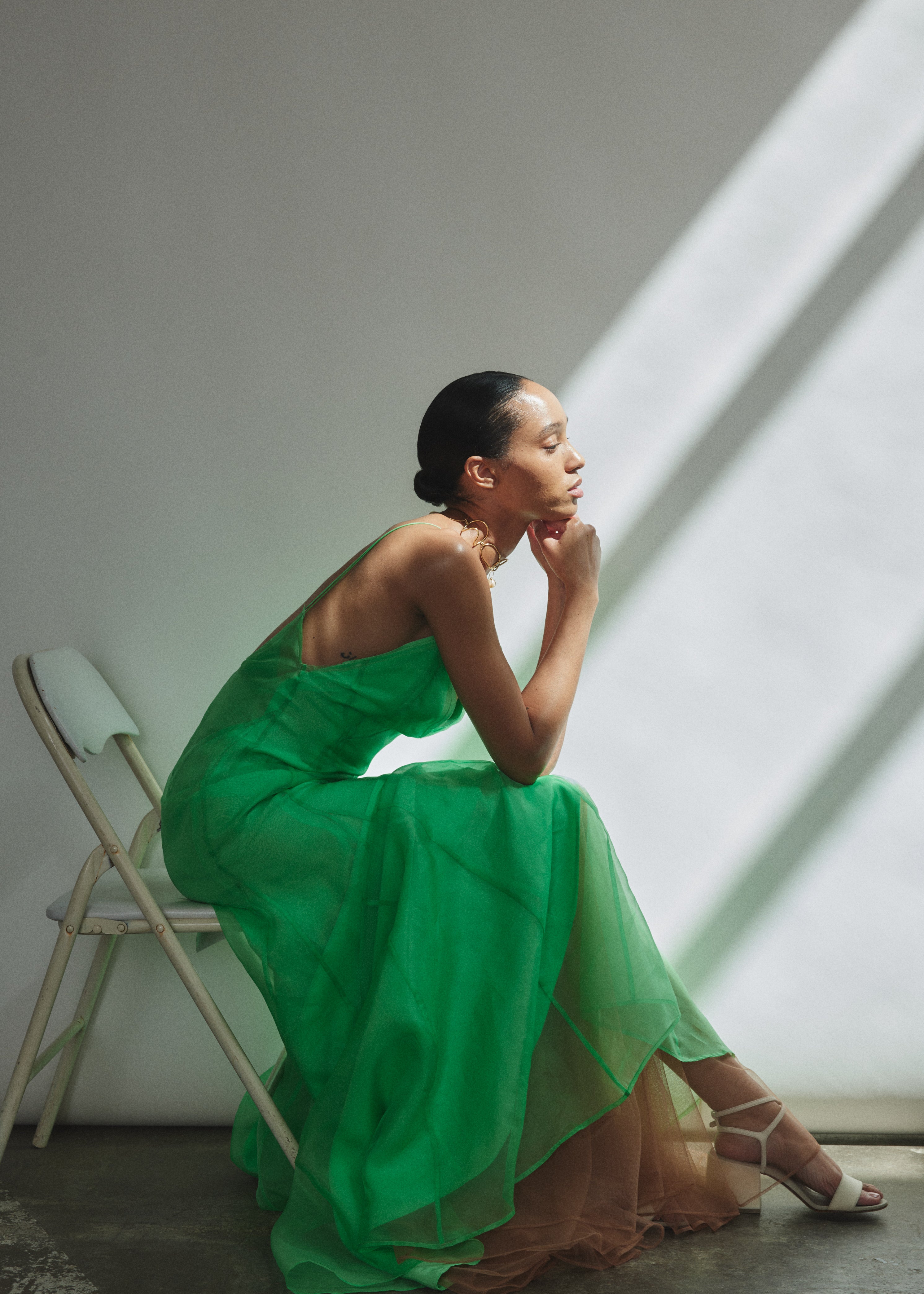 Detail of the V-neck and corded spaghetti straps on the celadon silk organza Kamperett Lalique Gown.