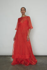 Angled view of the vermilion silk organza Kamperett Lalique Gown showing the intricately seamed construction.