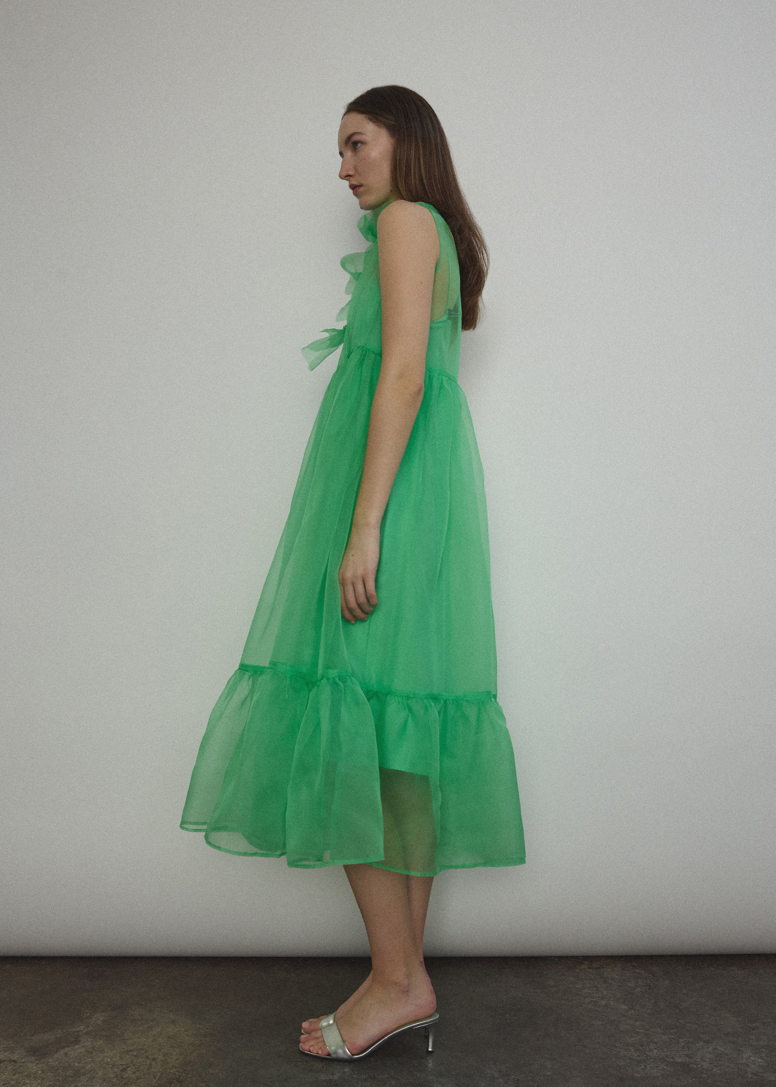 Angled view of the celadon silk organza Kamperett Mae Dress.