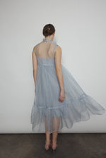 Editorial image of the powder blue silk organza Kamperett Mae Dress.