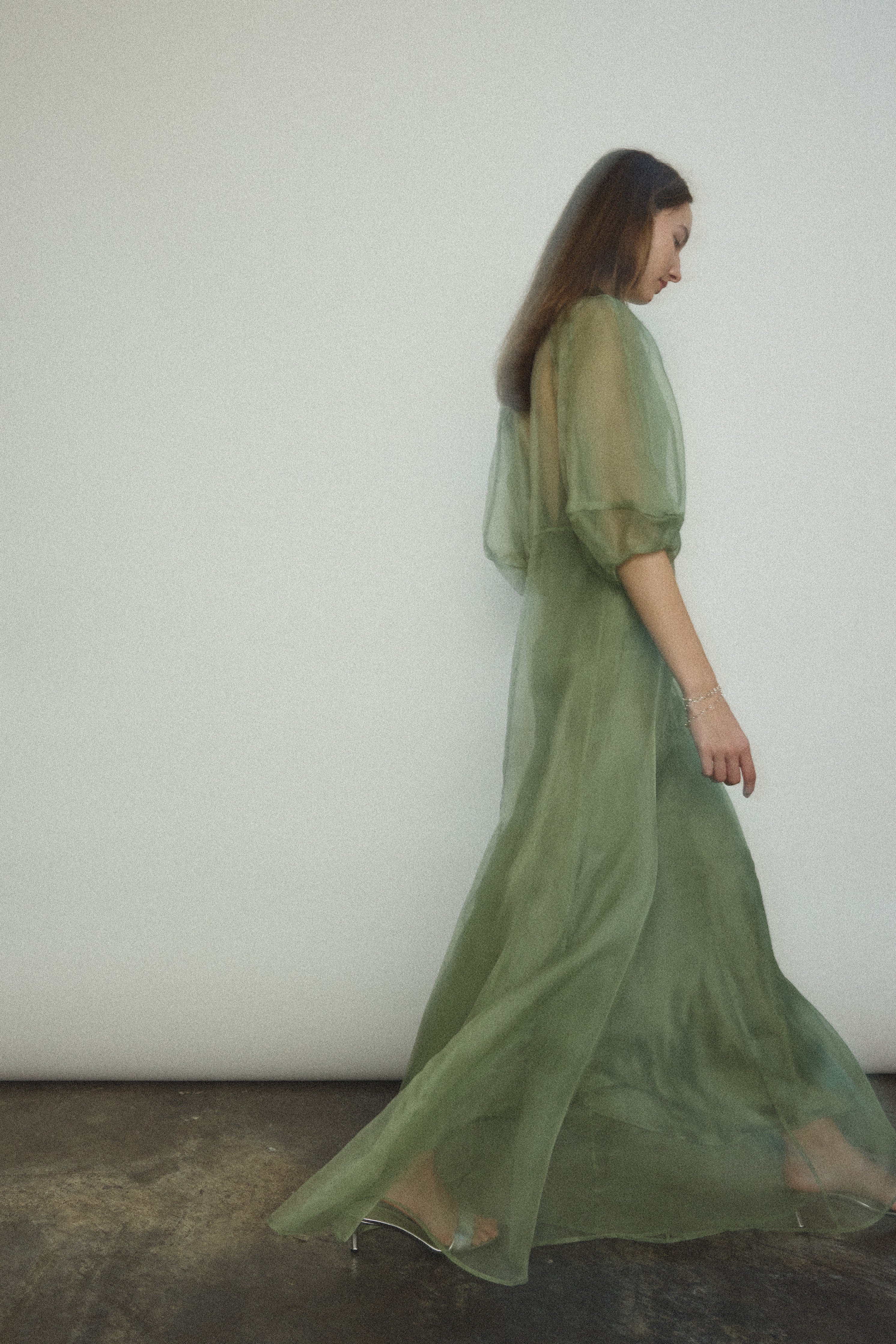 Alternate editorial image of the jade silk organza Kamperett Meiere Gown.