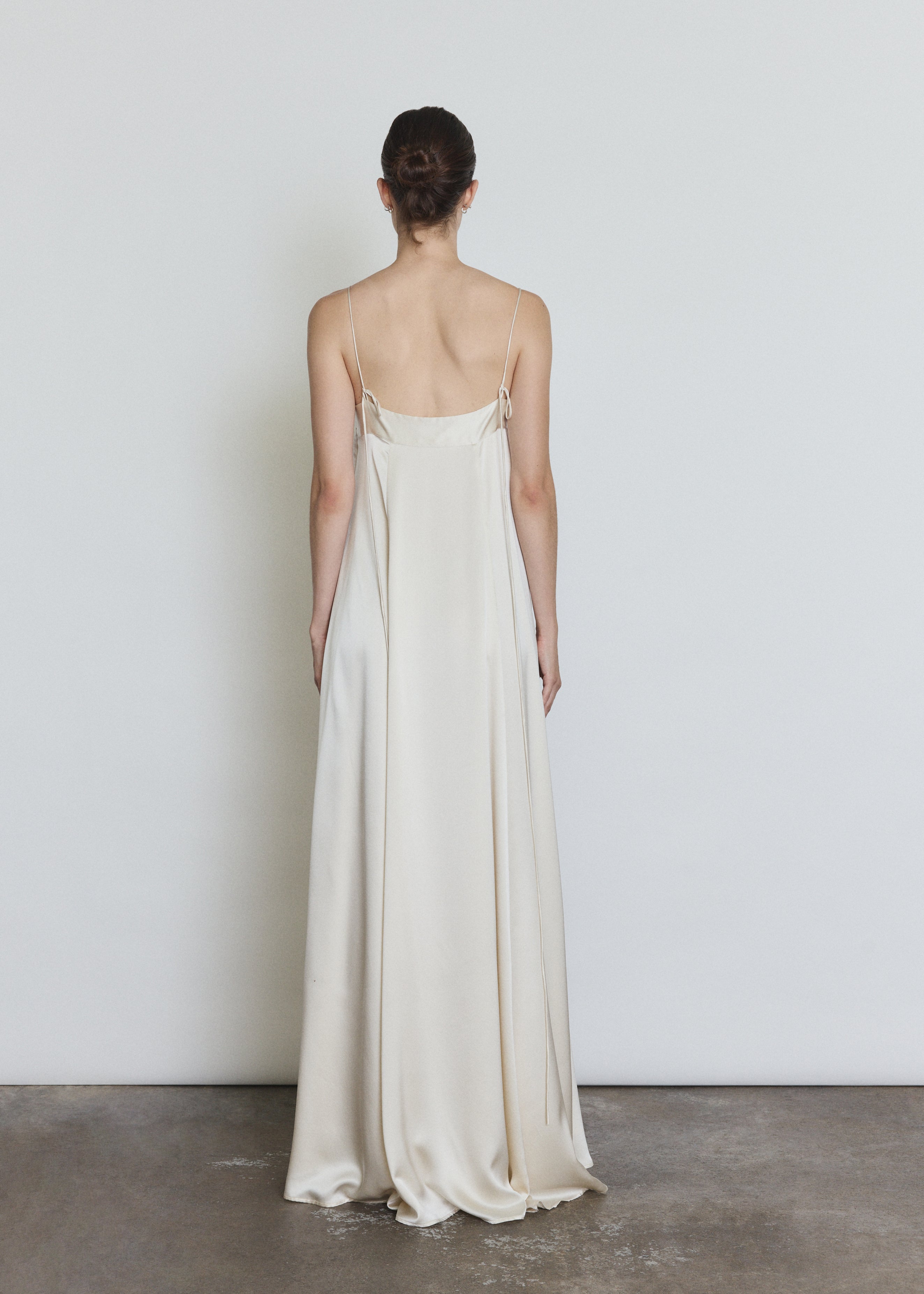 Back view of the ivory silk Kamperett Metronome Gown showing the corded straps.