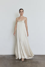 Detail of the ivory silk Kamperett Metronome Gown showing the fabric and in-seam pockets.