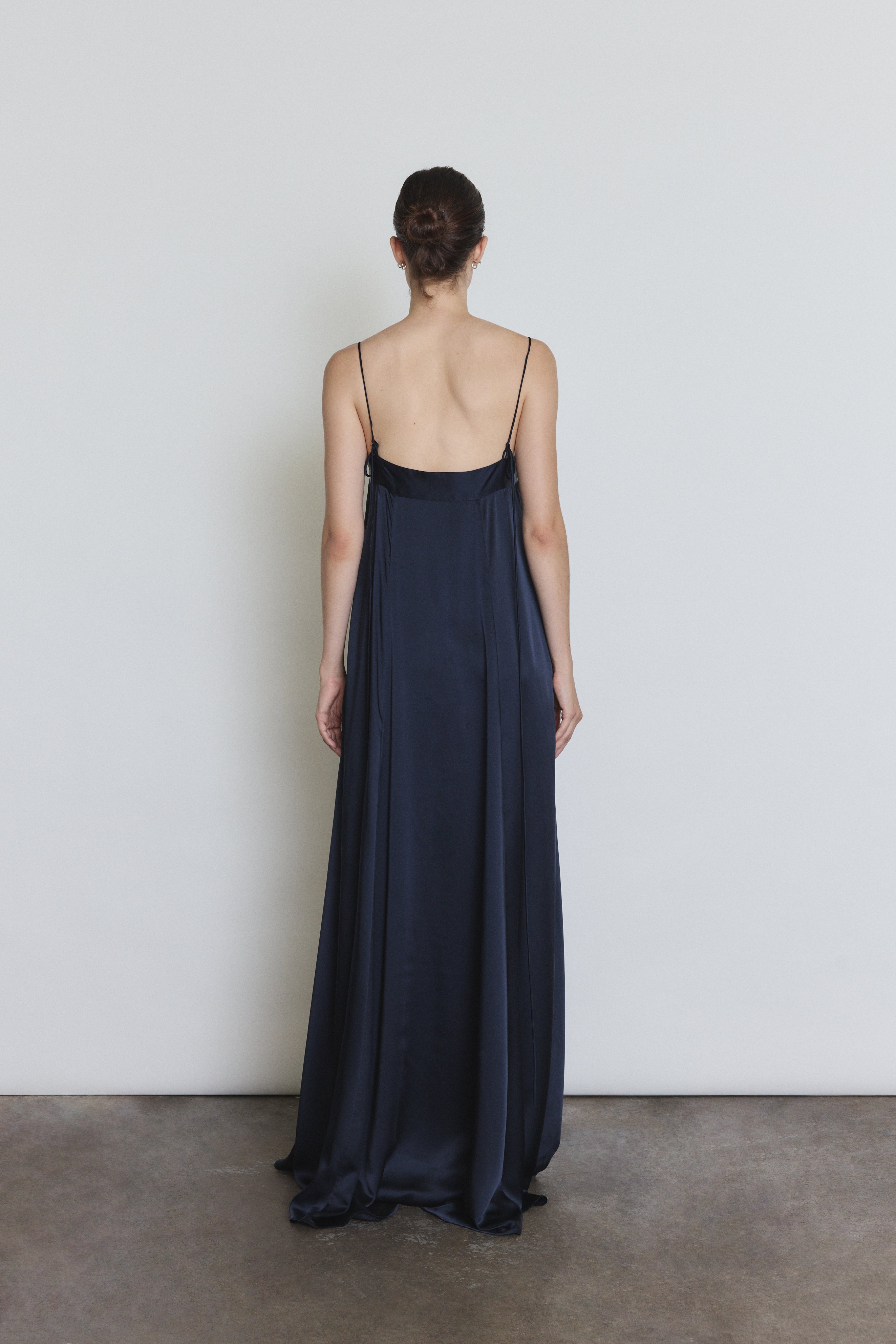 Back view of the midnight silk Kamperett Metronome Gown showing the corded straps.