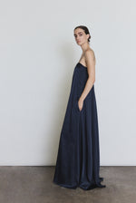Side view of the midnight silk Kamperett Metronome Gown showing the column silhouette.