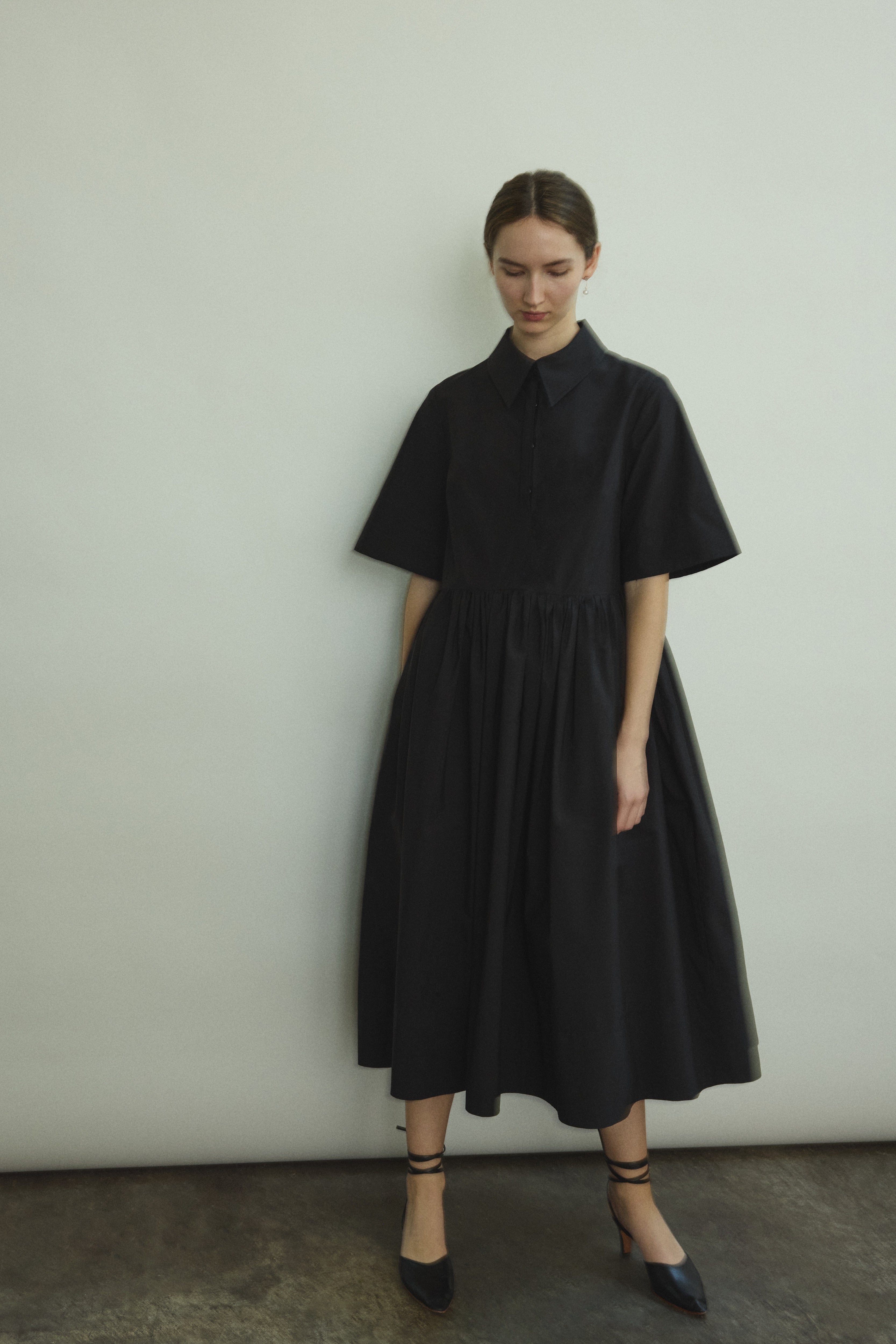 Editorial image of the black Japanese cotton lawn Kamperett Miller Dress.