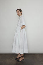 Editorial image of the white Japanese cotton lawn Kamperett Miller Dress.