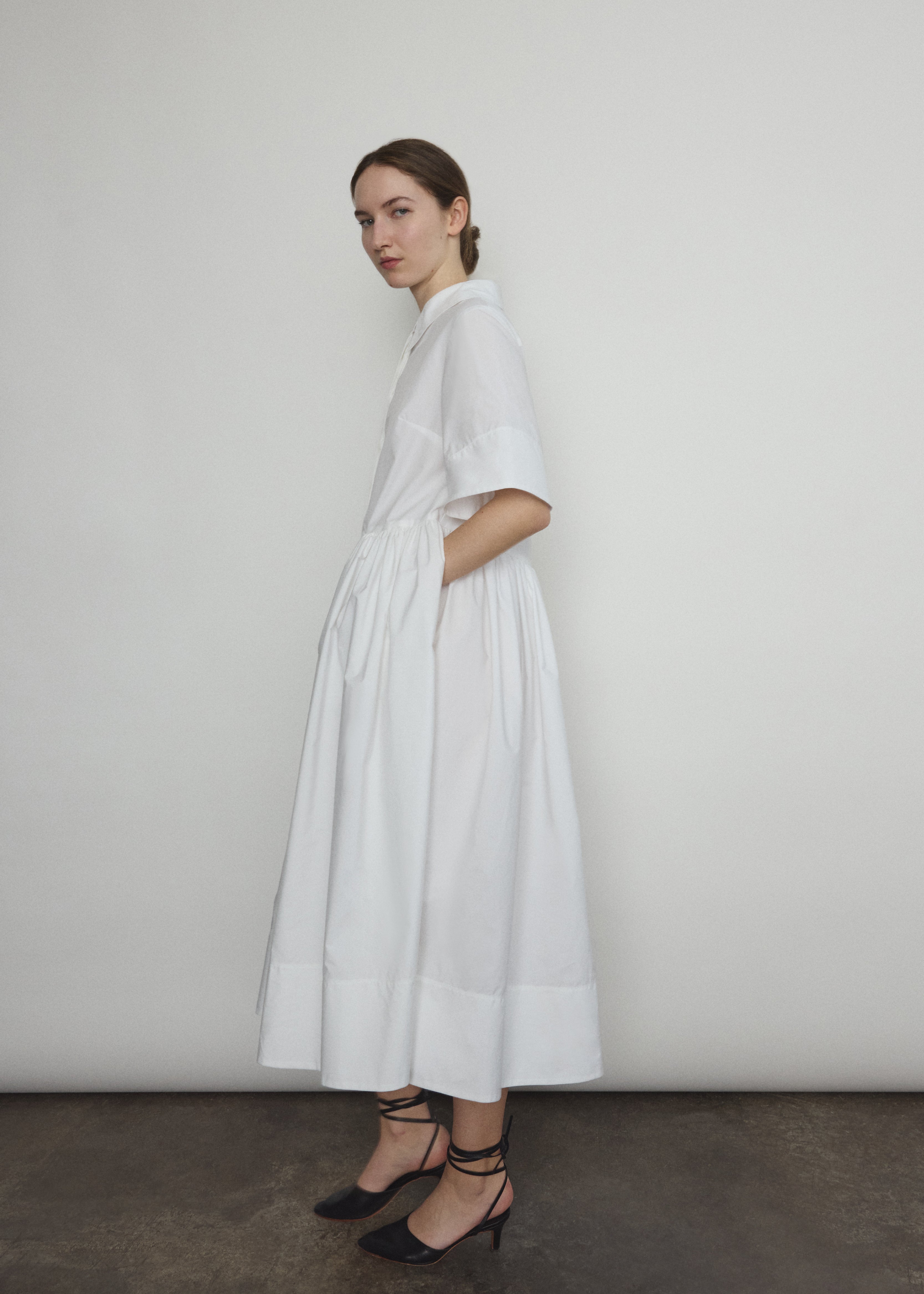 Editorial image of the white Japanese cotton lawn Kamperett Miller Dress.