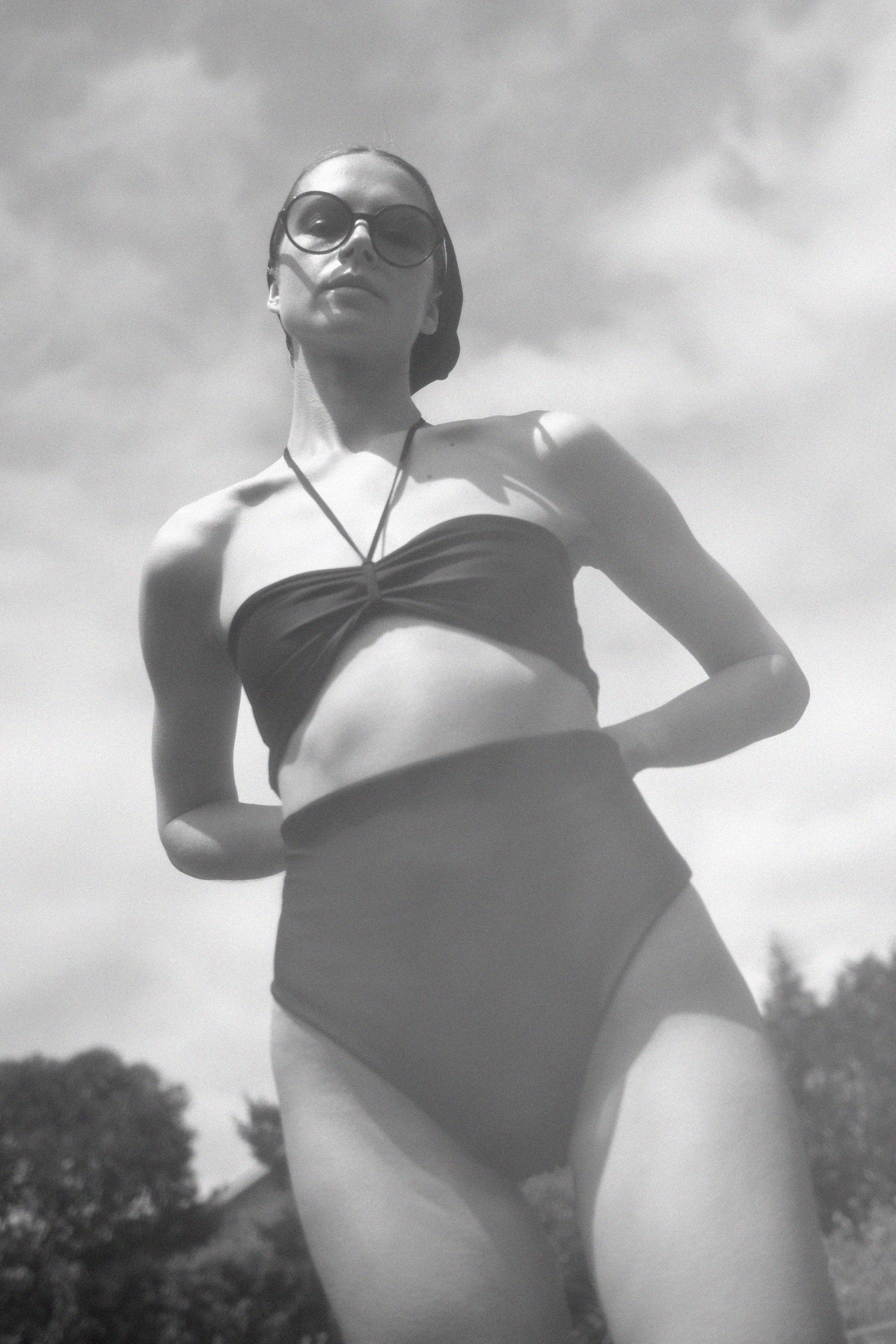 Back view of the black Italian regenerated nylon Kamperett Orra Bandeau Top.