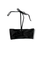 Flat image of the black Kamperett Orra Bandeau Top with halter cord attached.