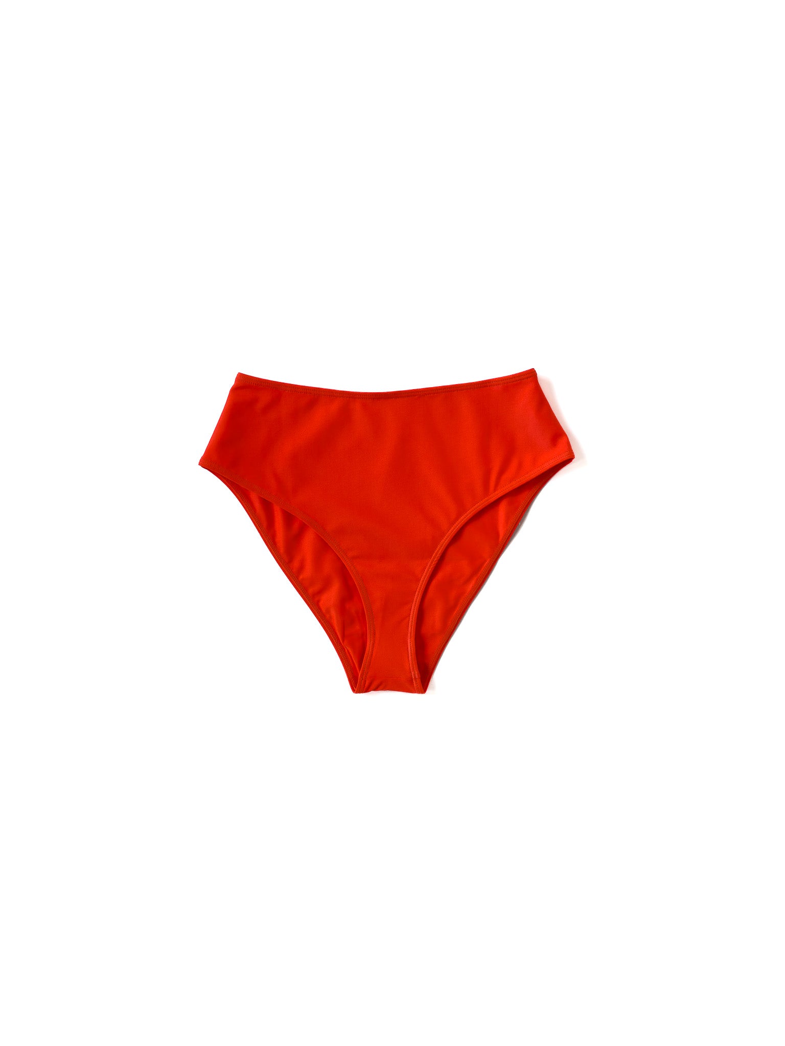 Flat image of the coral Italian regenerated nylon Kamperett Orra High Waist Brief.