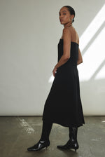 Detail of the sheer tulle illusion panel on the black crepe Kamperett Pirie Shift Dress.