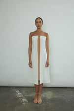 Side view of the ivory silk Kamperett Pirie Shift Dress with princess seaming.