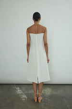 The ivory silk Kamperett Pirie Shift Dress styled layered over a slip or with the Leona Skirt or Huene Pant.