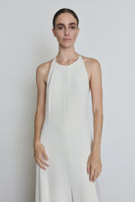 Side view of the alabaster silk crepe Kamperett Ray Gown showing the bias-skimming floor-length silhouette.