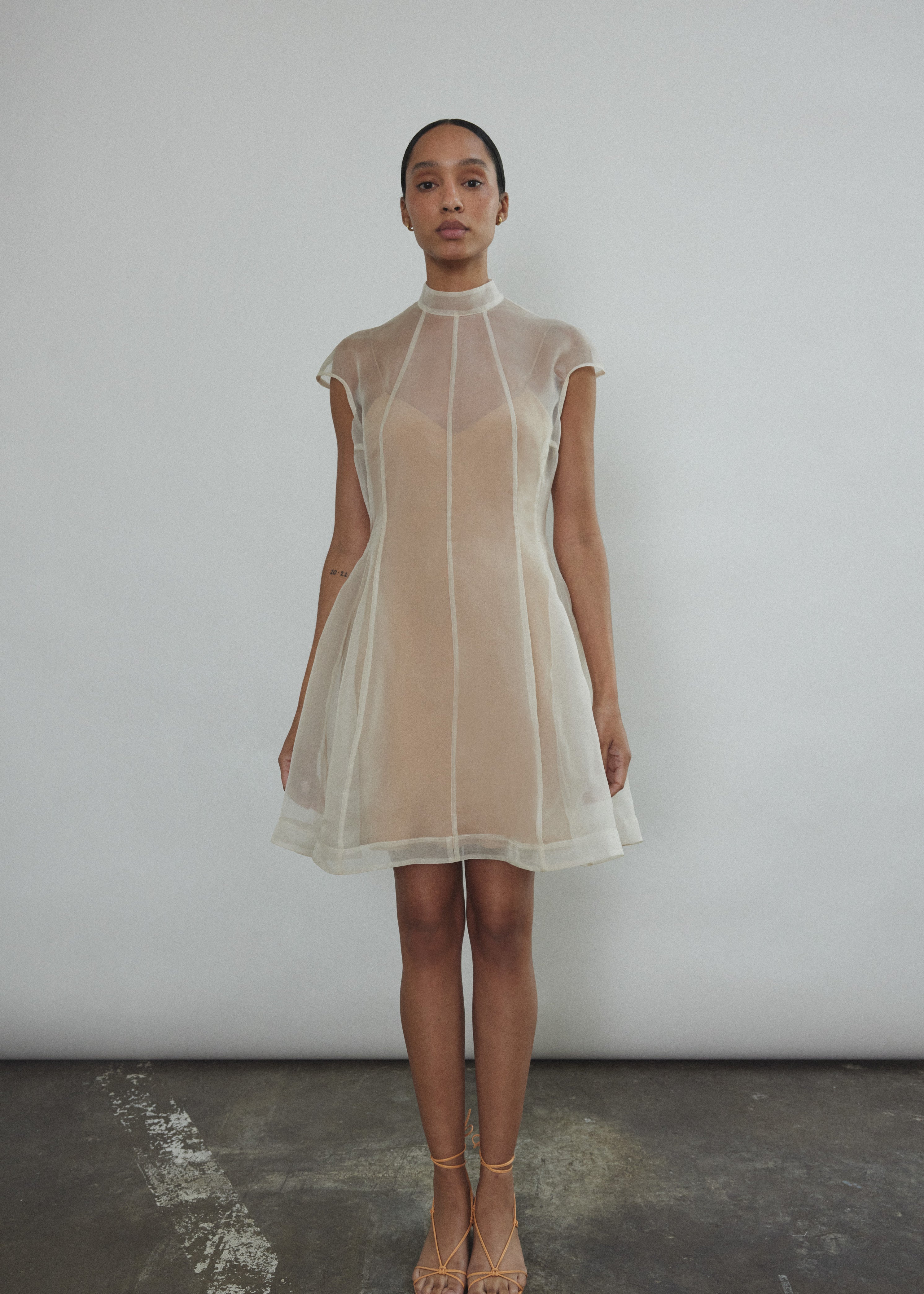 Back view of the ivory silk organza Kamperett Reine Dress with invisible zip closure.