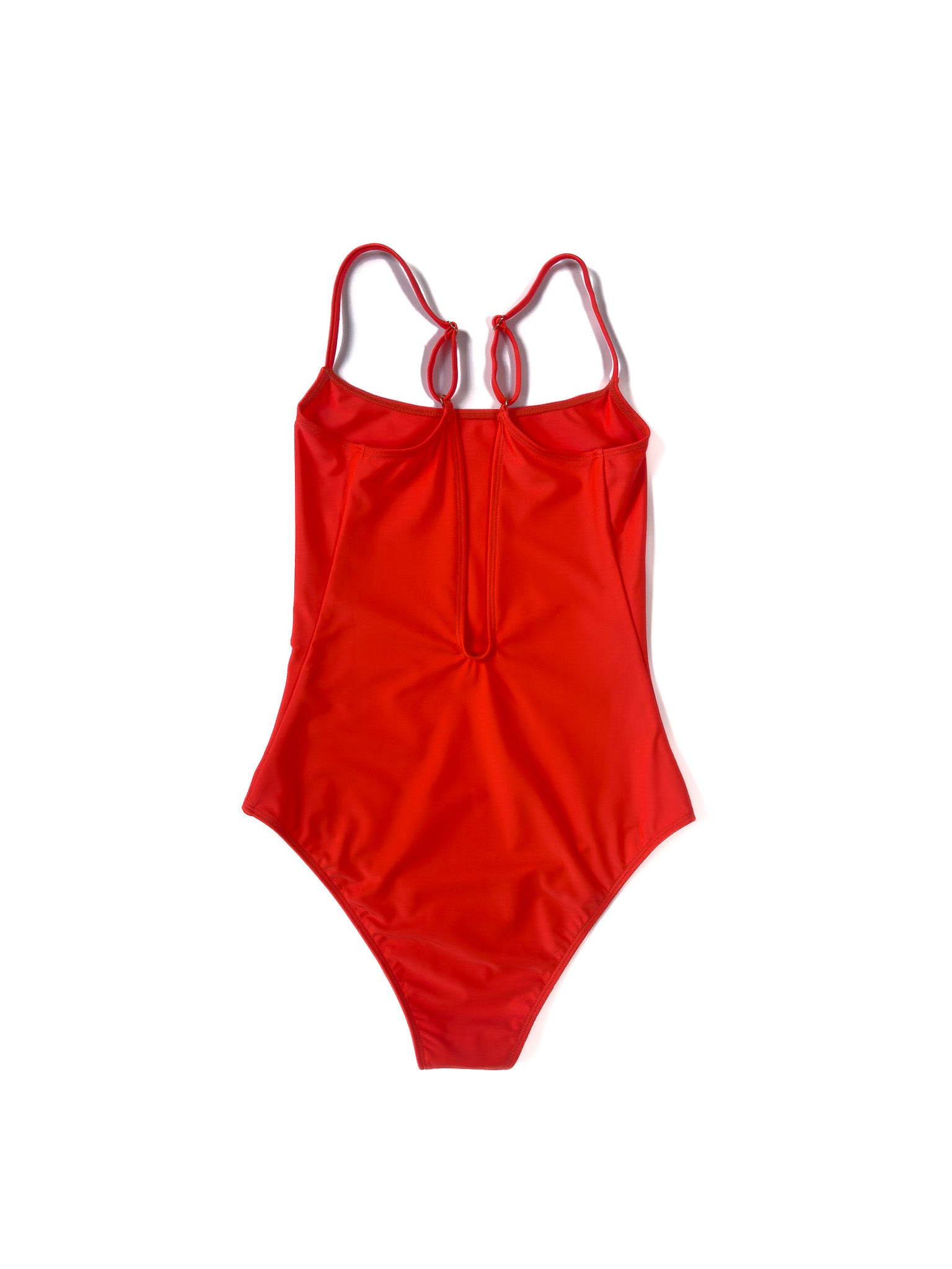 Flat back view of the coral Italian regenerated nylon Kamperett Selwood One Piece showing the deep V.