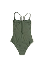 Flat back view of the sage Italian regenerated nylon Kamperett Selwood One Piece showing the deep V.