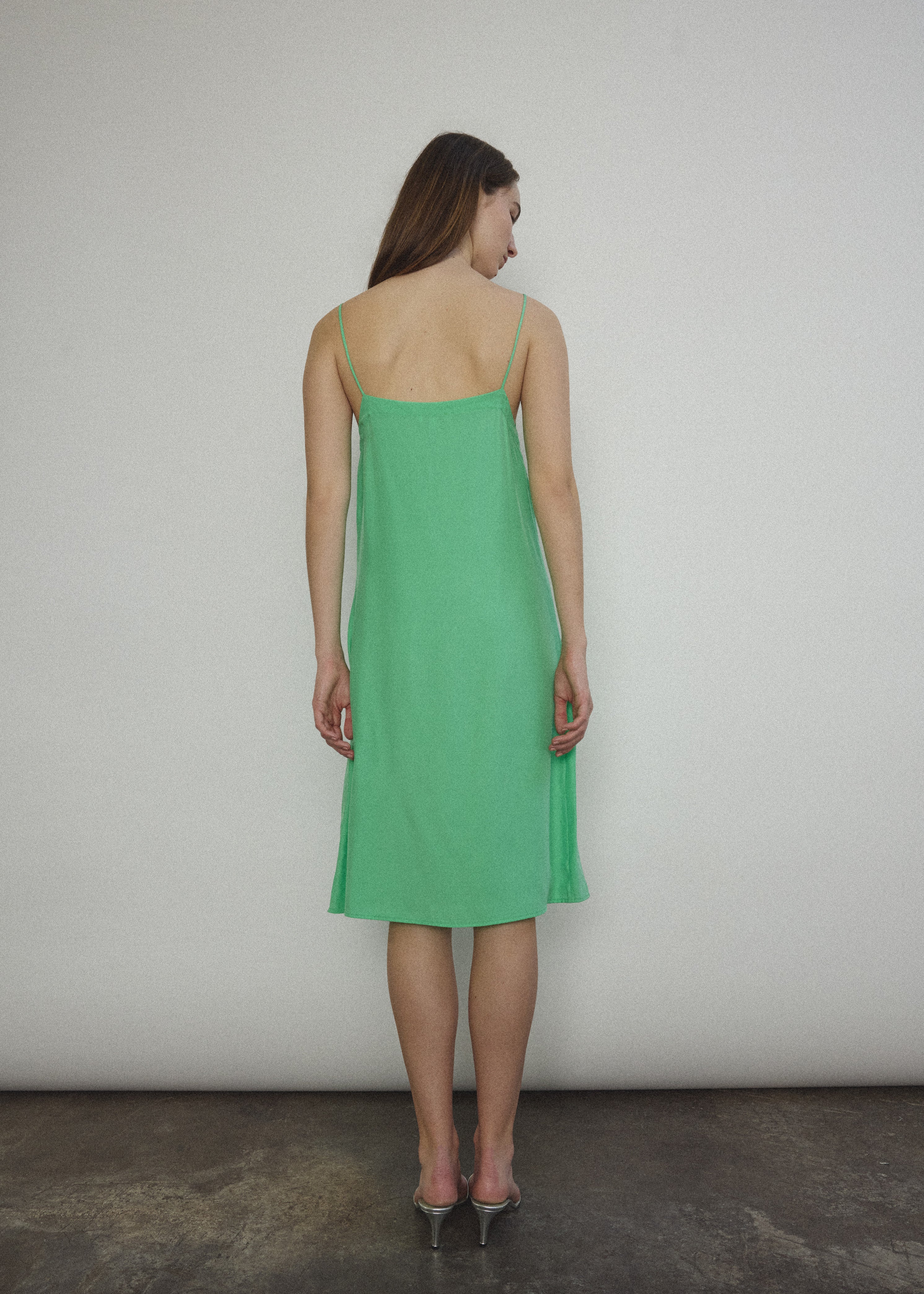 Back view of the celadon silk charmeuse Kamperett Short Slip.